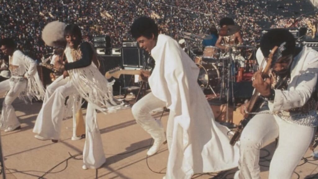 Band playing in front of stadium audience